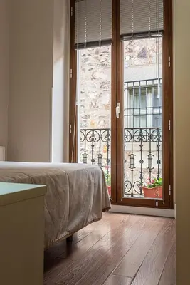 Cama o camas de una habitación en Domus Seleqtia Plaza de Santiago