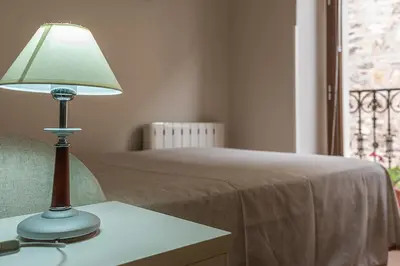 Cama o camas de una habitación en Domus Seleqtia Plaza de Santiago