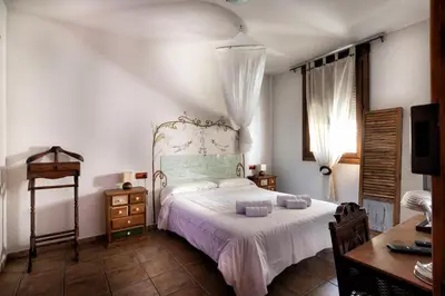 Cama o camas de una habitación en Vinarius, Posada Rural