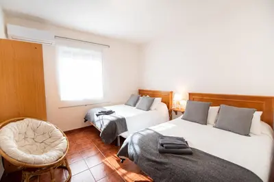 Cama o camas de una habitación en El Jardín del 22