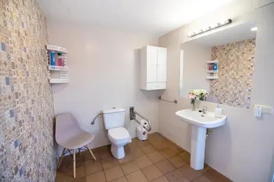 Un baño de El Jardín del 22