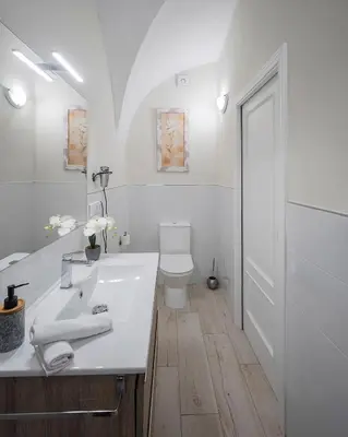 Un baño de Apartamentos Gladiador
