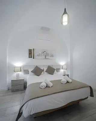 Cama o camas de una habitación en Apartamentos Gladiador