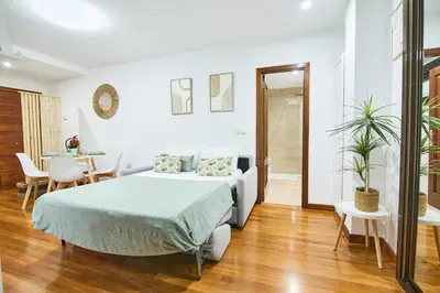 Cama o camas de una habitación en Serranos 24 Apartamento Rector Cobos