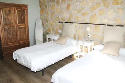 Cama o camas de una habitación en Casa Rural El Olivar de Valdefuentes
