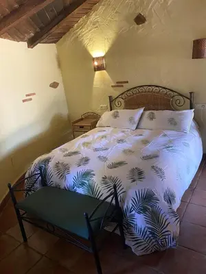 Cama o camas de una habitación en complejo rural el prado