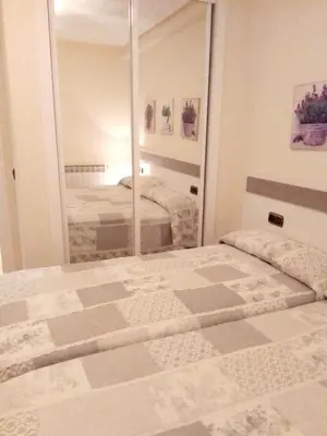 Cama o camas de una habitación en Modern apartment in Salamanca, 50 m², air-conditioned
