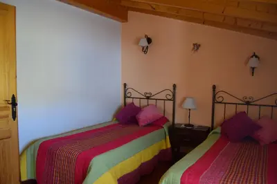 Cama o camas de una habitación en Casa Rural Abuelo Adón