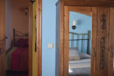 Cama o camas de una habitación en Casa Rural Abuelo Adón