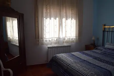 Cama o camas de una habitación en Casa Rural Abuelo Adón
