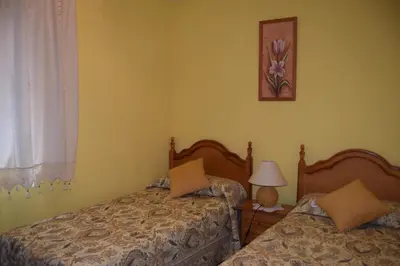 Cama o camas de una habitación en Casa Rural Abuelo Adón