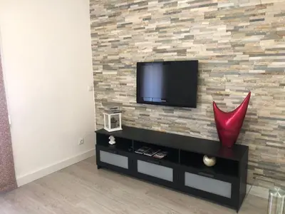 Una televisión o centro de entretenimiento en Casa Palacio Polentinos VUT-AV390
