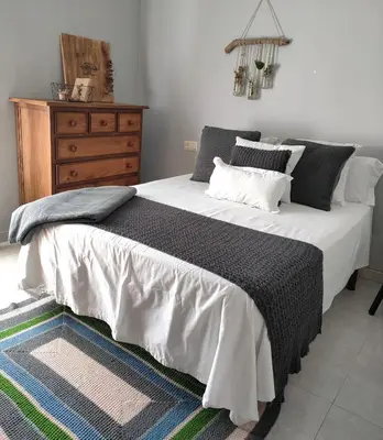 Cama o camas de una habitación en Acogedor apartamento VALLE DEL JERTE