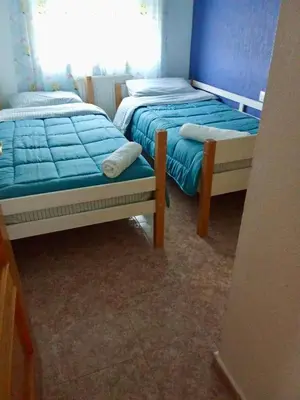 Cama o camas de una habitación en La Gitana