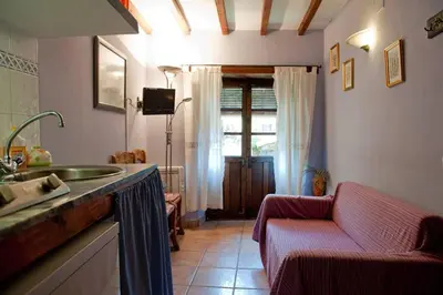 Una televisión o centro de entretenimiento en Charming studio in Robledillo de Gata - 28 m²
