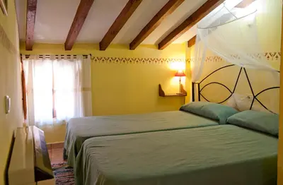 Cama o camas de una habitación en Comfortable Apartment in Robledillo de Gata with Balcony and View