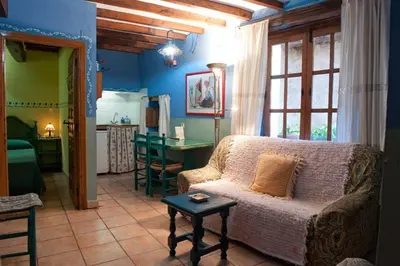 Zona de estar de Cosy Apartment in Robledillo de Gata - 45 sqm - Fireplace