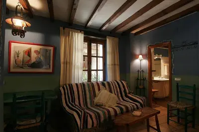 Zona de estar de Cosy Apartment in Robledillo de Gata - 45 sqm - Fireplace