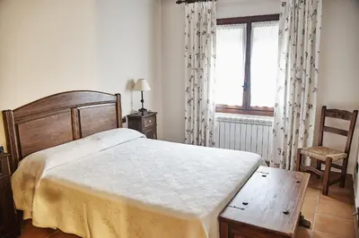 Cama o camas de una habitación en Casa Rural El Cantueso