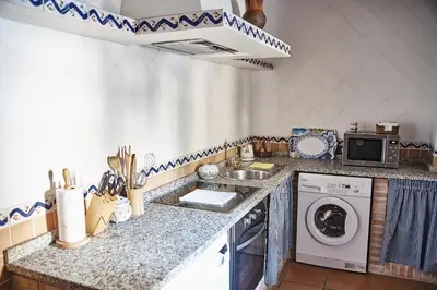 Una cocina o zona de cocina en Casa Rural El Cantueso