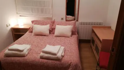 Cama o camas de una habitación en Céntrico y luminoso San Vicente