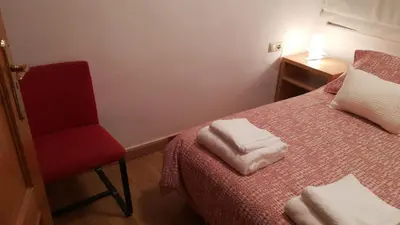 Cama o camas de una habitación en Céntrico y luminoso San Vicente