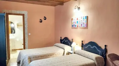 Cama o camas de una habitación en Elegant Villa with Private Pool in Jerte