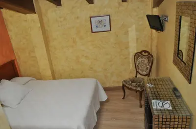 Cama o camas de una habitación en Casa Rural Carpintero