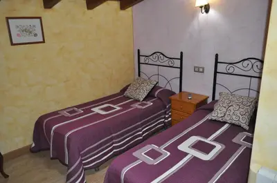 Cama o camas de una habitación en Casa Rural Carpintero