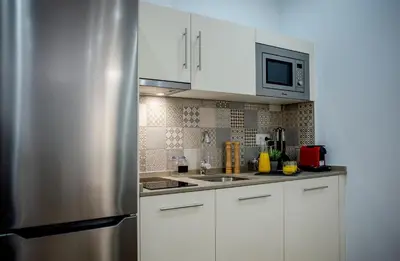 Una cocina o zona de cocina en Apartamentos Turísticos Moret11-1B