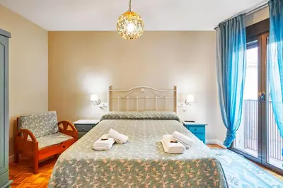 Cama o camas de una habitación en Santa Clara centro by Gestión VUT Salamanca