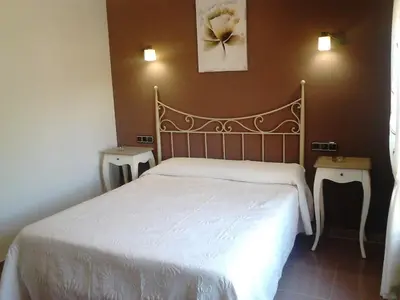 Cama o camas de una habitación en Hostal Restaurante Solaire