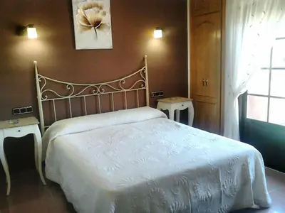 Cama o camas de una habitación en Hostal Restaurante Solaire