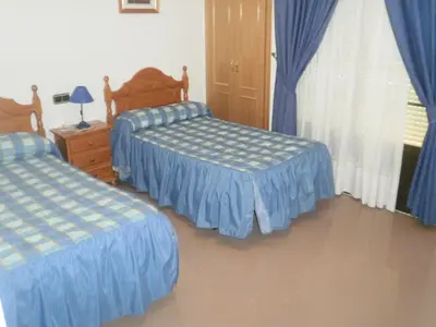 Cama o camas de una habitación en Hostal Restaurante Solaire
