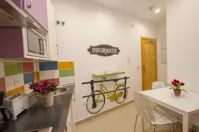Una cocina o zona de cocina en Apartamentos El Templo Suites