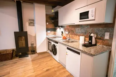 Una cocina o zona de cocina en Apartamentos A Fala en Trevejo y San Martin de Trevejo, Sierra de Gata