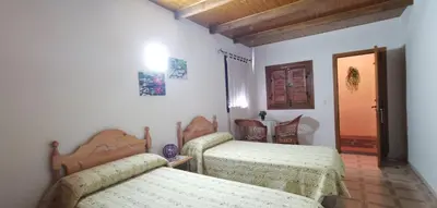 Cama o camas de una habitación en Casa Rural Casona de Jerte