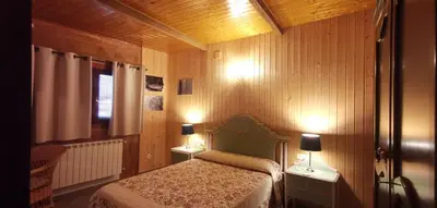 Cama o camas de una habitación en Casa Rural Casona de Jerte