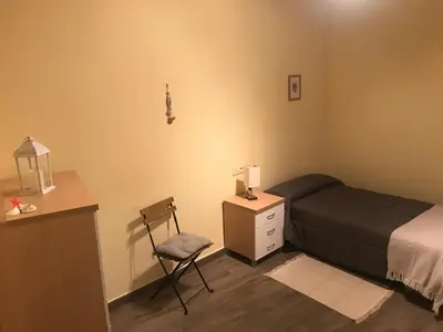 Cama o camas de una habitación en LA GARGANTILLA