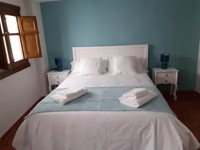 Cama o camas de una habitación en La Calleja del Canchal