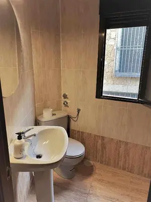 Un baño de Casa del Puente - MurallaHomes