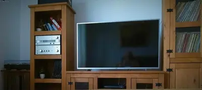Una televisión o centro de entretenimiento en Casa del Puente - MurallaHomes