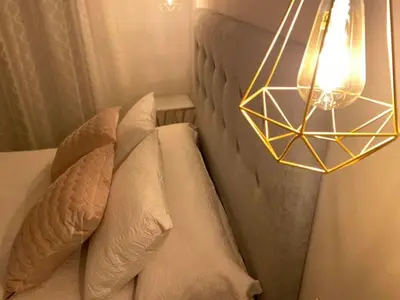 Cama o camas de una habitación en EL HOSPEDAJE DEL REY
