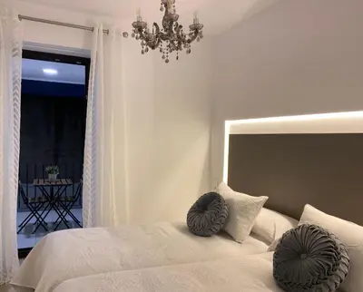 Cama o camas de una habitación en EL HOSPEDAJE DEL REY