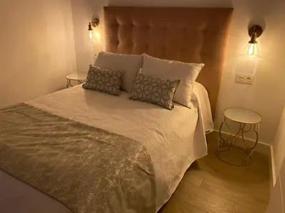 Cama o camas de una habitación en EL HOSPEDAJE DEL REY