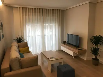 Una televisión o centro de entretenimiento en Apartamento Abuelo Mayorga