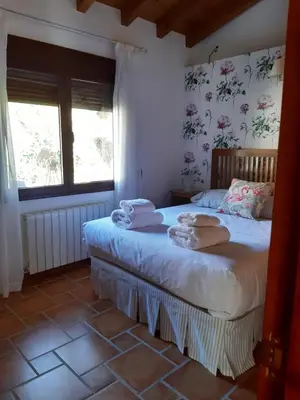 Cama o camas de una habitación en Casa rural Quinta de los Almiares