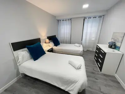 Cama o camas de una habitación en DAU Centro Free Parking