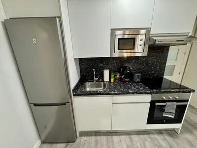 Una cocina o zona de cocina en DAU Centro