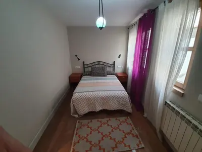 Cama o camas de una habitación en Principal Plaza